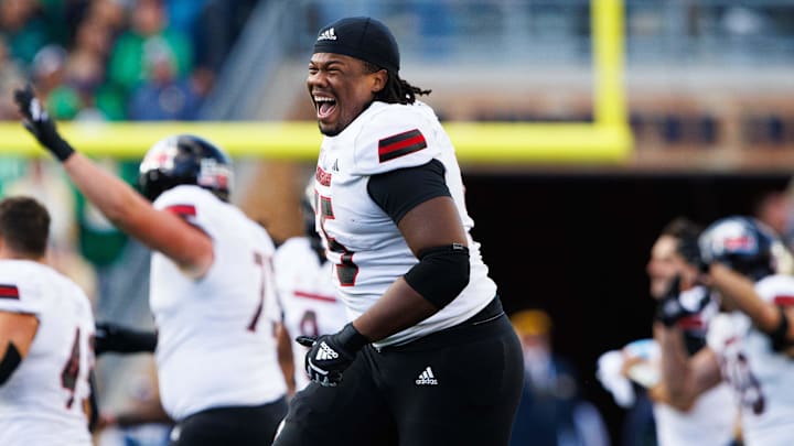 Northern Illinois offensive lineman Abiathar Curry jumps in the air in celebration after winning a NCAA college football game 16-14 against Notre Dame at Notre Dame Stadium on Saturday, Sept. 7, 2024, in South Bend. Northern Illinois offensive lineman Abiathar Curry jumps in the air in celebration after winning a NCAA college football game 16-14 against Notre Dame at Notre Dame Stadium on Saturday, Sept. 7, 2024, in South Bend.