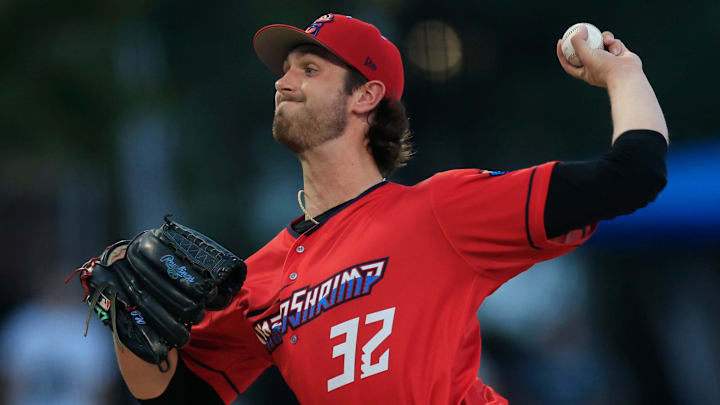 Jacksonville Jumbo Shrimp pitcher Thomas White (32) fires in a pitch.