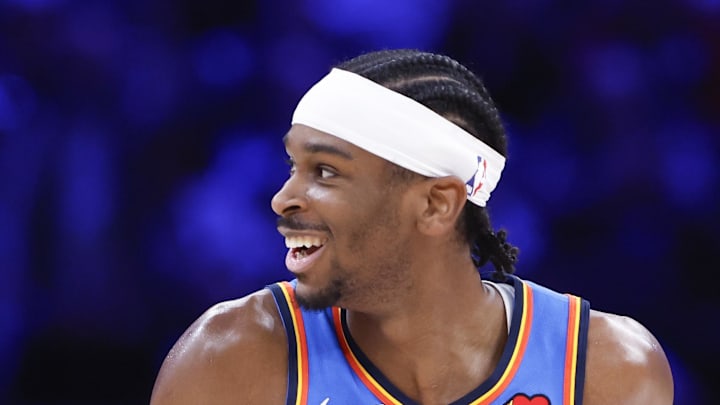 Oklahoma City Thunder guard Shai Gilgeous-Alexander smiles after scoring against the Toronto Raptors.