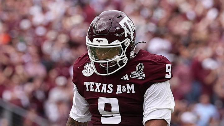 Texas A&M Aggies defensive end Cashius Howell (9) reacts during first half of the first-round game of the CFP National Playoff against the Miami Hurricanes at Kyle Field.