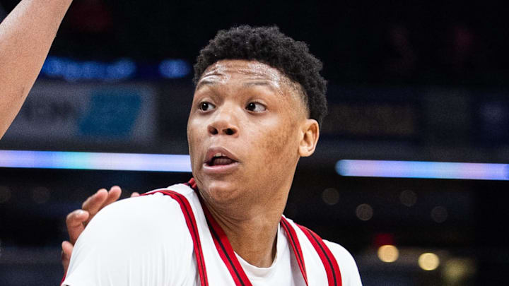 Mar 12, 2025; Indianapolis, IN, USA;  Rutgers Scarlet Knights guard Ace Bailey (4) shoots the ball while USC Trojans guard Kevin Patton Jr. (8) defends in the second half at Gainbridge Fieldhouse. Mandatory Credit: Trevor Ruszkowski-Imagn Images