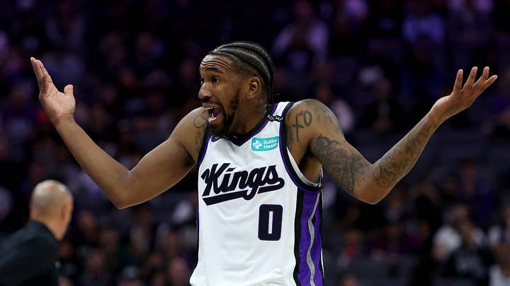 Oct 25, 2026; Sacramento, California, USA;  Sacramento Kings guard Malik Monk (0) reacts towards referee, John Butler, after a play against the Memphis Grizzlies during the second quarter at Golden 1 Center.  Mandatory Credit: Dennis Lee-Imagn Images