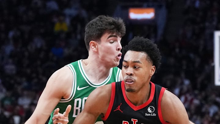 Toronto Raptors forward Scottie Barnes controls the ball as Boston Celtics guard Hugo Gonzalez tries to defend. Toronto Raptors forward Scottie Barnes controls the ball as Boston Celtics guard Hugo Gonzalez tries to defend.