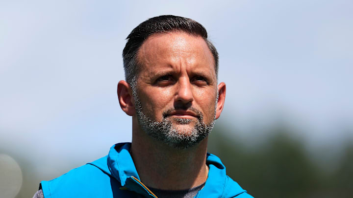Jacksonville Jaguars defensive coordinator Anthony Campanile walks off the field to be interviewed by media members after an NFL training camp session at the Miller Electric Center, Thursday, Aug. 14, 2025 in Jacksonville, Fla.