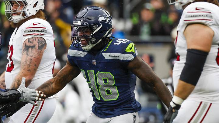 Nov 24, 2024; Seattle, Washington, USA; Seattle Seahawks linebacker Tyrice Knight (48) celebrates with linebacker Ernest Jones IV (13) following a sack against the Arizona Cardinals during the first quarter at Lumen Field. Nov 24, 2024; Seattle, Washington, USA; Seattle Seahawks linebacker Tyrice Knight (48) celebrates with linebacker Ernest Jones IV (13) following a sack against the Arizona Cardinals during the first quarter at Lumen Field.