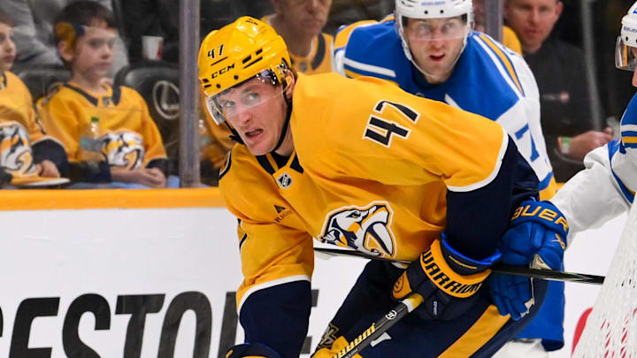 Feb 2, 2026; Nashville, Tennessee, USA; Nashville Predators right wing Michael McCarron (47) passes the puck from behind the net against the St. Louis Blues during the second period at Bridgestone Arena. Mandatory Credit: Steve Roberts-Imagn Images Feb 2, 2026; Nashville, Tennessee, USA; Nashville Predators right wing Michael McCarron (47) passes the puck from behind the net against the St. Louis Blues during the second period at Bridgestone Arena. Mandatory Credit: Steve Roberts-Imagn Images