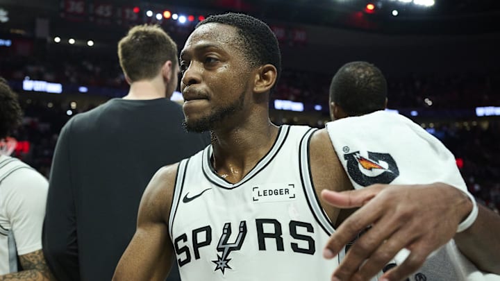 Apr 26, 2026; Portland, Oregon, USA; San Antonio Spurs guard De'aaron Fox (4) celebrates with teammates after a game against the Portland Trail Blazers during game four of the first round of the 2026 NBA Playoffs at Moda Center. Mandatory Credit: Troy Wayrynen-Imagn Images