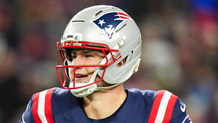 Jan 11, 2026; Foxborough, MA, USA; New England Patriots quarterback Drake Maye (10) smiles after a touchdown pass during the fourth quarter against the Los Angeles Chargers in an AFC Wild Card Round game at Gillette Stadium. Mandatory Credit: David Butler II-Imagn Images