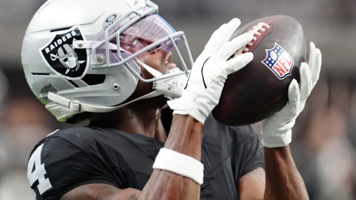 Dec 28, 2025; Paradise, Nevada, USA; Las Vegas Raiders wide receiver Shedrick Jackson (4) warms up before the game against the New York Giants at Allegiant Stadium. Mandatory Credit: Stephen R. Sylvanie-Imagn Images