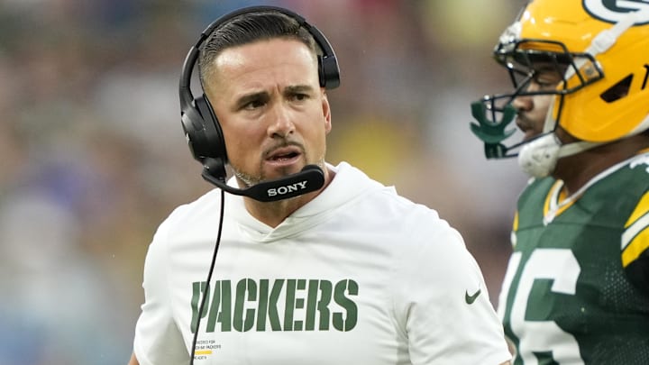 Green Bay Packers head coach Matt LaFleur looks to the sideline as Green Bay Packers cornerback Bo Melton (16) runs off the field during the first quarter against the New York Jets at Lambeau Field. 