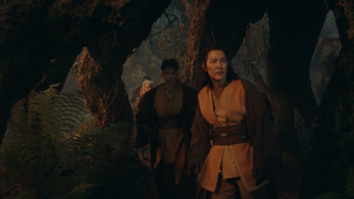 (Clockwise from front): Master Sol (Lee Jung-jae), Yord Fandar (Charlie Barnett) and Jedi Padawan Jecki Lon (Dafne Keen) in Lucasfilm's THE ACOLYTE, season one, exclusively on Disney+. ©2024 Lucasfilm Ltd. & TM. All Rights Reserved.