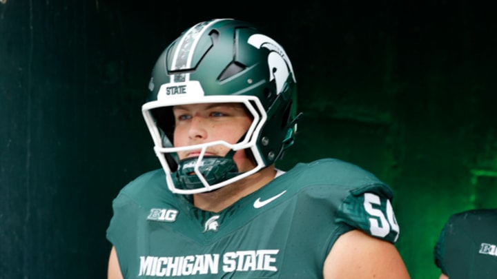 Michigan State Spartans offensive lineman Cooper Terpstra emerges from the tunnel before a game against the Penn State Nittany Lions at Spartan Stadium on Nov. 15, 2025.