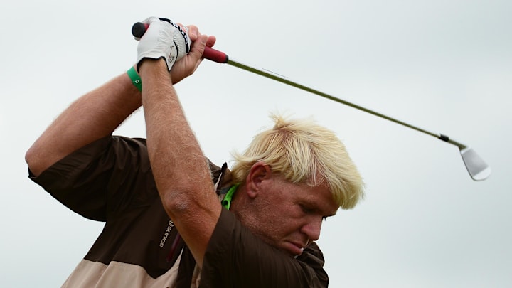 John Daly tees off on the 5th hole during the practice round of the 2012 British Open Championship at Royal Lytham & St. Annes Golf Club. He made the cut but failed to contend as Ernie Els took the title.