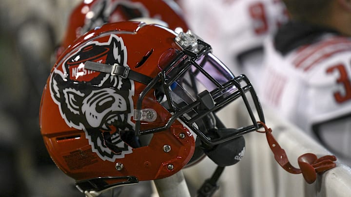 Nov 13, 2021; Winston-Salem, North Carolina, USA; A North Carolina State Wolfpack helmet seen on the sideline during the second half against the Wake Forest Demon Deacons at Truist Field. Mandatory Credit: William Howard-Imagn Images