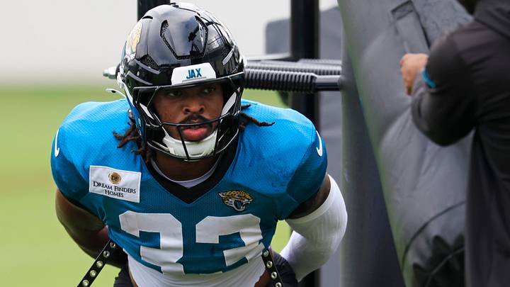 Jacksonville Jaguars running back Bhayshul Tuten (33) looks on as a bag is about to swing his way during the sixth day of NFL training camp at the Miller Electric Center on Tuesday, Aug. 4, 2026, in Jacksonville, Fla. Jacksonville Jaguars running back Bhayshul Tuten (33) looks on as a bag is about to swing his way during the sixth day of NFL training camp at the Miller Electric Center on Tuesday, Aug. 4, 2026, in Jacksonville, Fla.