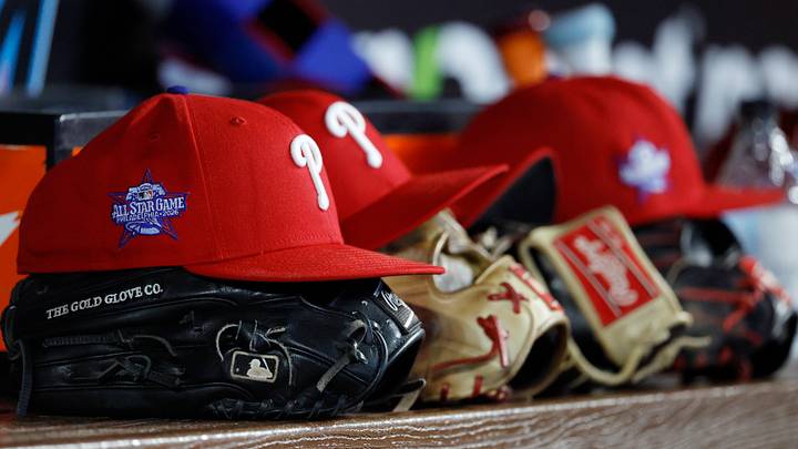 May 2, 2026; Miami, Florida, USA; Philadelphia Phillies starting hats and gloves sit on the bench against the Miami Marlins during the fifth inning at loanDepot Park. Mandatory Credit: Rhona Wise-Imagn Images May 2, 2026; Miami, Florida, USA; Philadelphia Phillies starting hats and gloves sit on the bench against the Miami Marlins during the fifth inning at loanDepot Park. Mandatory Credit: Rhona Wise-Imagn Images