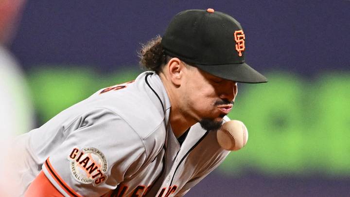 Cleveland, Ohio, USA; San Francisco Giants shortstop Willy Adames (2) makes an error on a ball hit by Cleveland Guardians catcher Austin Hedges (not pictured) during the seventh inning at Progressive Field. Mandatory Credit: Ken Blaze-Imagn Images