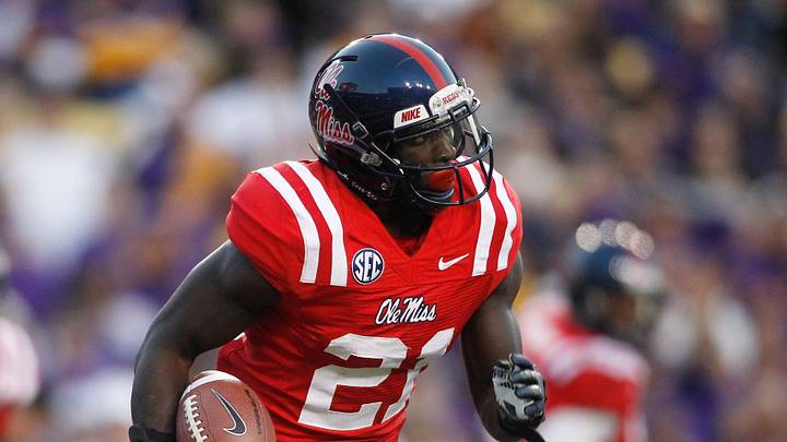 Ole Miss Rebels defensive back Senquez Golson carries the ball after an interception against the LSU Tigers during the second half at Tiger Stadium. Ole Miss Rebels defensive back Senquez Golson carries the ball after an interception against the LSU Tigers during the second half at Tiger Stadium.