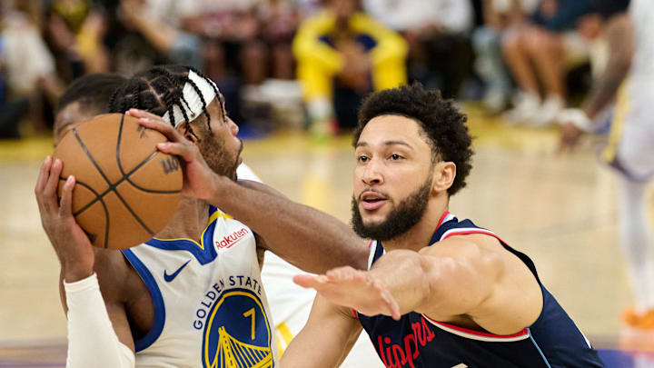 Apr 13, 2025; San Francisco, California, USA; LA Clippers guard Ben Simmons (25) defends against Golden State Warriors guard Buddy Hield (7) during the third quarter at Chase Center. Mandatory Credit: Robert Edwards-Imagn Images Apr 13, 2025; San Francisco, California, USA; LA Clippers guard Ben Simmons (25) defends against Golden State Warriors guard Buddy Hield (7) during the third quarter at Chase Center. Mandatory Credit: Robert Edwards-Imagn Images