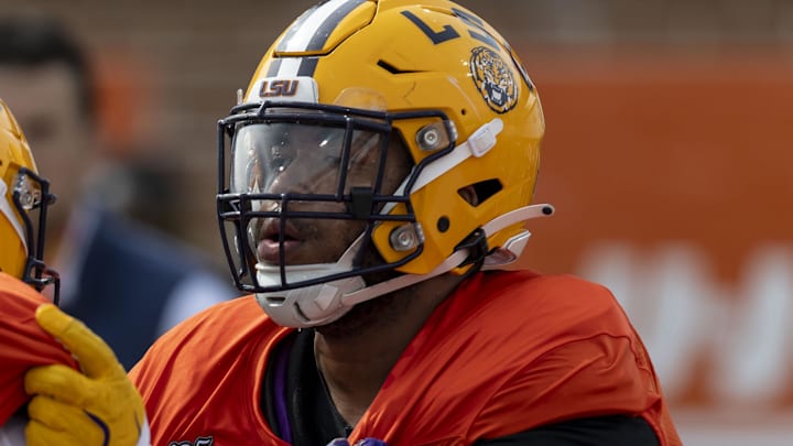 American team offensive lineman Miles Frazier of LSU (70). American team offensive lineman Miles Frazier of LSU (70).