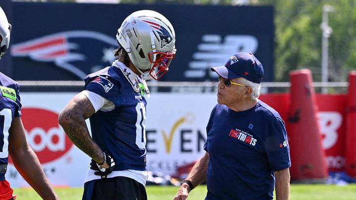 Jul 25, 2026; Foxborough, MA, USA; New England Patriots owner Robert Kraft speaks to New England Patriots cornerback Christian Gonzalez (0) at training camp at Gillette Stadium. Mandatory Credit: Eric Canha-Imagn Images