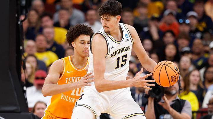 Mar 29, 2026; Chicago, IL, USA; Michigan Wolverines center Aday Mara (15) drives against Tennessee Volunteers forward Nate Ament (10) in the first half during an Elite Eight game of the Midwest Regional of the men's 2026 NCAA Tournament at United Center. Mandatory Credit: Kamil Krzaczynski-Imagn Images Mar 29, 2026; Chicago, IL, USA; Michigan Wolverines center Aday Mara (15) drives against Tennessee Volunteers forward Nate Ament (10) in the first half during an Elite Eight game of the Midwest Regional of the men's 2026 NCAA Tournament at United Center. Mandatory Credit: Kamil Krzaczynski-Imagn Images