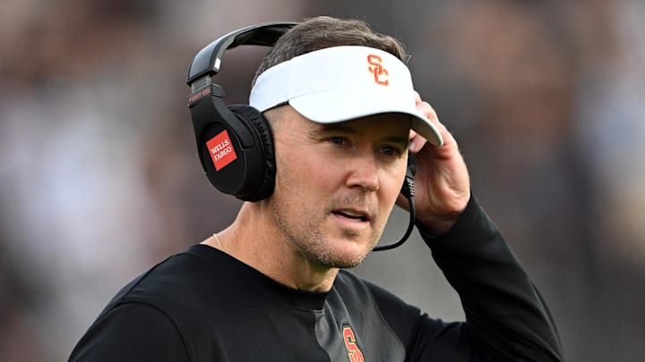 Sep 13, 2025; West Lafayette, Indiana, USA; Southern California Trojans head coach Lincoln Riley stands on the sidelines during the first quarter against the Purdue Boilermakers at Ross-Ade Stadium. Mandatory Credit: Marc Lebryk-Imagn Images