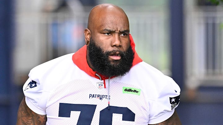 Jun 9, 2025; Foxborough, MA, USA; New England Patriots offensive tackle Morgan Moses (76) walks to the practice fields at Gillette Stadium. Mandatory Credit: Eric Canha-Imagn Images
