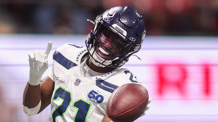 Seattle Seahawks cornerback Devon Witherspoon (21) celebrates