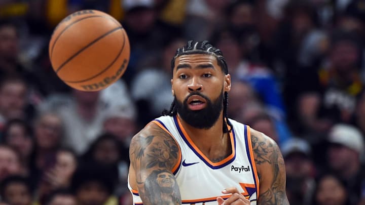 Oct 25, 2025; Denver, Colorado, USA; Phoenix Suns center Nick Richards (2) passes the ball ahead to guard Collin Gillespie (12) during the second half against the Denver Nuggets at Ball Arena. Mandatory Credit: Christopher Hanewinckel-Imagn Images