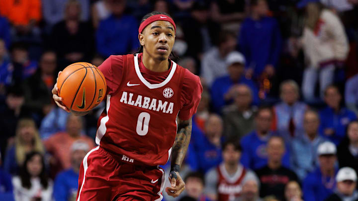 Feb 1, 2026; Gainesville, Florida, USA; Alabama Crimson Tide guard Labaron Philon (0) dribbles the ball against the Florida Gators during the first half at Exactech Arena at the Stephen C. O'Connell Center. Mandatory Credit: Matt Pendleton-Imagn Images