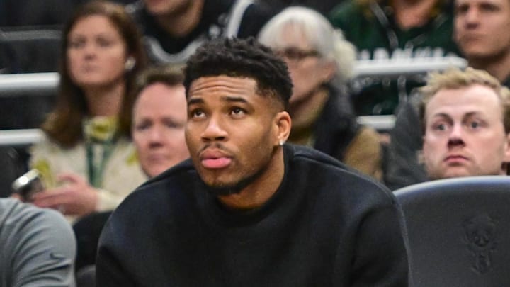 Dec 11, 2025; Milwaukee, Wisconsin, USA; Milwaukee Bucks forward Giannis Antetokounmpo (34) watches the game against the Boston Celtics from the bench in the second quarter at Fiserv Forum. Mandatory Credit: Benny Sieu-Imagn Images