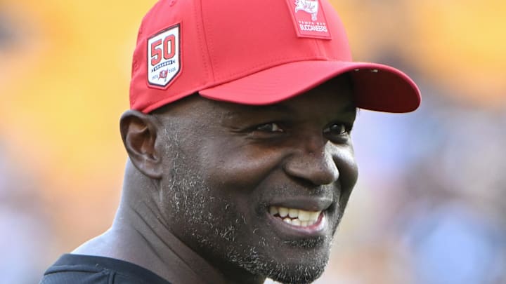 Aug 16, 2025; Pittsburgh, Pennsylvania, USA; TTampa Bay Buccaneers head coach Todd Bowles () warms up for a game against the Pittsburgh Steelers at Acrisure Stadium. Mandatory Credit: Barry Reeger-Imagn Images