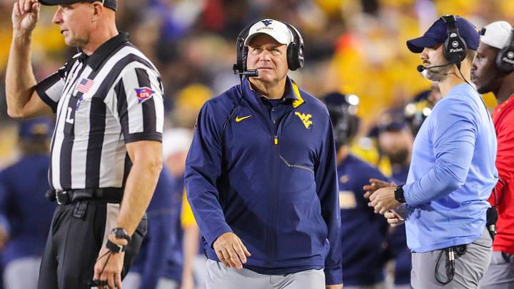 Sep 26, 2026; Morgantown, West Virginia, USA; West Virginia Mountaineers head coach Rich Rodriguez walks along the sideline during the third quarter against the Oklahoma State Cowboys at Milan Puskar Stadium. Mandatory Credit: Ben Queen-Imagn Images Sep 26, 2026; Morgantown, West Virginia, USA; West Virginia Mountaineers head coach Rich Rodriguez walks along the sideline during the third quarter against the Oklahoma State Cowboys at Milan Puskar Stadium. Mandatory Credit: Ben Queen-Imagn Images