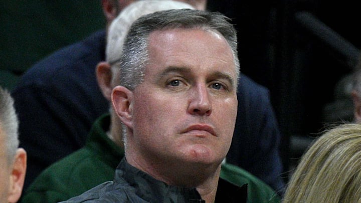 Dec 2, 2025; East Lansing, Michigan, USA;  Michigan State head football coach Pat Fitzgerald watches the Spartans defeat the Iowa Hawkeyes at Jack Breslin Student Events Center. Mandatory Credit: Dale Young-Imagn Images