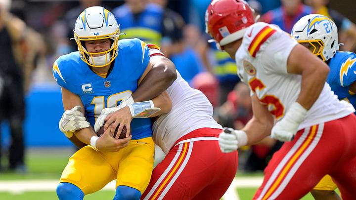 Sep 29, 2024; Inglewood, California, USA; Los Angeles Chargers quarterback Justin Herbert (10) is sacked by Kansas City Chiefs defensive tackle Chris Jones (95) in the first half at SoFi Stadium. Mandatory Credit: Jayne Kamin-Oncea-Imagn Images Sep 29, 2024; Inglewood, California, USA; Los Angeles Chargers quarterback Justin Herbert (10) is sacked by Kansas City Chiefs defensive tackle Chris Jones (95) in the first half at SoFi Stadium. Mandatory Credit: Jayne Kamin-Oncea-Imagn Images