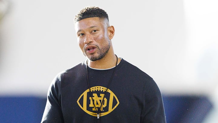 Notre Dame head coach Marcus Freeman greets his players during a Notre Dame football spring practice at Irish Athletic Center on Wednesday, March 19, 2025, in South Bend.