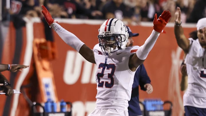 Sep 28, 2024; Salt Lake City, Utah, USA; Arizona Wildcats defensive back Emmanuel Karnley (23) reacts after breaking up a pass intended for Utah Utes wide receiver Dorian Singer (3) during the second quarter at Rice-Eccles Stadium. Mandatory Credit: Rob Gray-Imagn Images