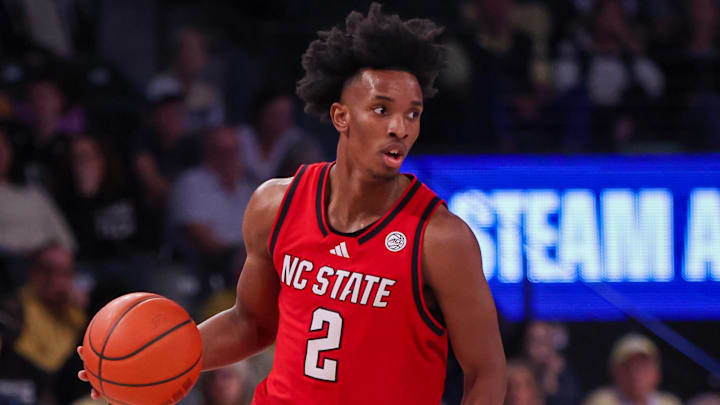 Mar 1, 2025; Atlanta, Georgia, USA; North Carolina State Wolfpack guard Paul McNeil (2) dribbles against the Georgia Tech Yellow Jackets in the first half at McCamish Pavilion. Mandatory Credit: Brett Davis-Imagn Images
