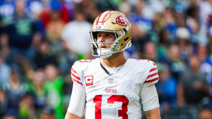 Sep 7, 2025; Seattle, Washington, USA; San Francisco 49ers quarterback Brock Purdy (13) reacts following a failed third down play against the Seattle Seahawks during the fourth quarter at Lumen Field. Mandatory Credit: Joe Nicholson-Imagn Images Sep 7, 2025; Seattle, Washington, USA; San Francisco 49ers quarterback Brock Purdy (13) reacts following a failed third down play against the Seattle Seahawks during the fourth quarter at Lumen Field. Mandatory Credit: Joe Nicholson-Imagn Images