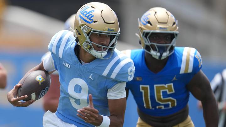 May 2, 2026; Pasadena, CA, USA; UCLA Bruins quarterback Nico Iamaleava (9) carries the ball during the spring game at Rose Bowl. Mandatory Credit: Kirby Lee-Imagn Images