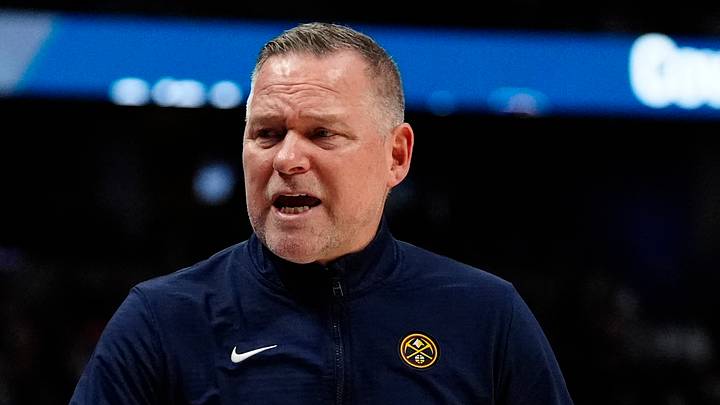 Feb 20, 2025; Denver, Colorado, USA; Denver Nuggets head coach Michael Malone calls out in the second half against the Charlotte Hornets at Ball Arena. Mandatory Credit: Ron Chenoy-Imagn Images