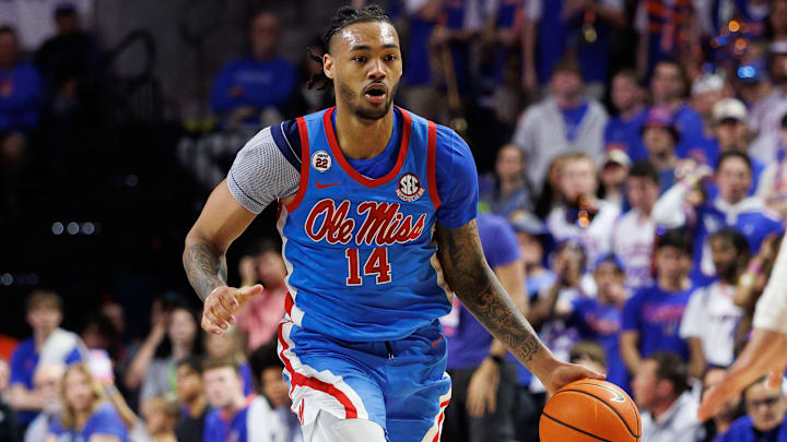 Mar 8, 2025; Gainesville, Florida, USA; Mississippi Rebels guard Dre Davis (14) dribbles the ball against the Florida Gators during the first half at Exactech Arena at the Stephen C. O'Connell Center. Mandatory Credit: Matt Pendleton-Imagn Images