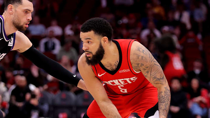 Mar 1, 2025; Houston, Texas, USA; Houston Rockets guard Fred VanVleet (5) handles the ball against Sacramento Kings guard Zach LaVine (8) during the first quarter at Toyota Center. Mandatory Credit: Erik Williams-Imagn Images