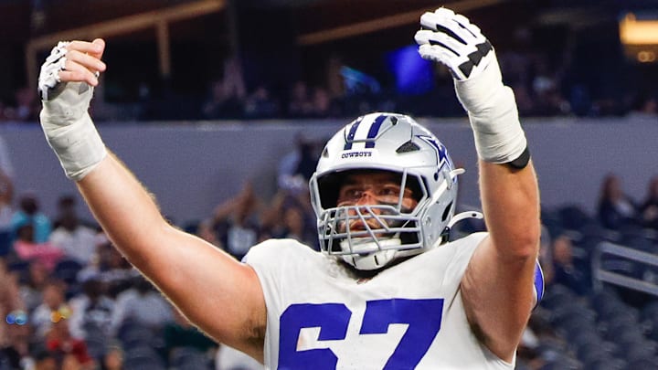 Aug 22, 2025; Arlington, Texas, USA; Dallas Cowboys center Brock Hoffman (67) celebrates after a touchdown during the fourth quarter against the Atlanta Falcons at AT&T Stadium. Mandatory Credit: Andrew Dieb-Imagn Images