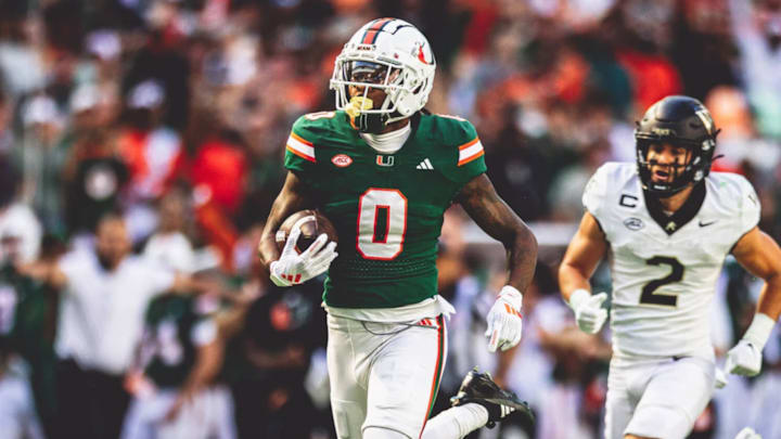 Miami Hurricanes Senior Mishael Powell (0) returning an interception for a touchdown against Wake Forest in the second quarter.