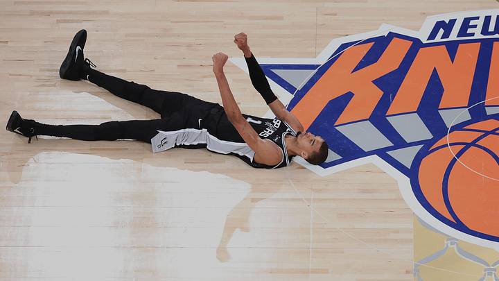 Jun 8, 2026; New York, New York, USA; San Antonio Spurs forward Victor Wembanyama (1) lies on the court and reacts against the New York Knicks during Game 3 of the 2026 NBA Finals in the fourth quarter at Madison Square Garden. Jun 8, 2026; New York, New York, USA; San Antonio Spurs forward Victor Wembanyama (1) lies on the court and reacts against the New York Knicks during Game 3 of the 2026 NBA Finals in the fourth quarter at Madison Square Garden.