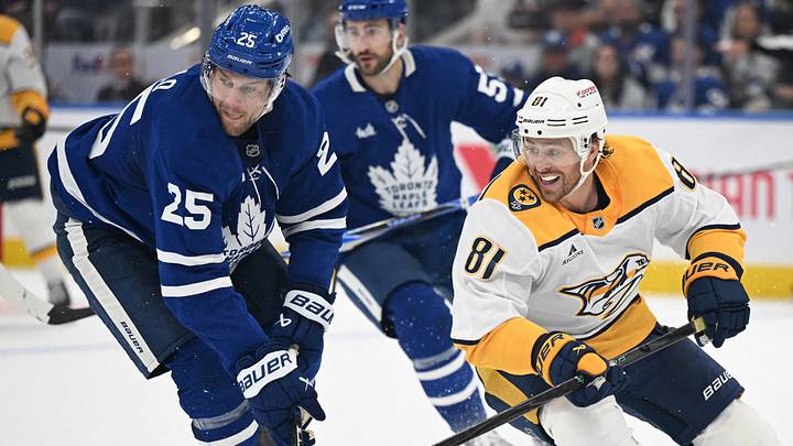 Oct 14, 2025; Toronto, Ontario, CAN; Nashville Predators forward Jonathan Marchessault (81) skates past Toronto Maple Leafs defenseman Brandon Carlo (25) in the second period at Scotiabank Arena. Mandatory Credit: Dan Hamilton-Imagn Images Oct 14, 2025; Toronto, Ontario, CAN; Nashville Predators forward Jonathan Marchessault (81) skates past Toronto Maple Leafs defenseman Brandon Carlo (25) in the second period at Scotiabank Arena. Mandatory Credit: Dan Hamilton-Imagn Images