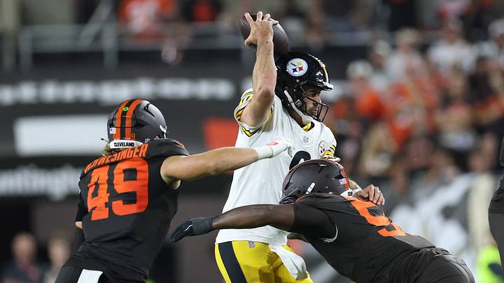 Cleveland Browns defensive tackle Mike Hall Jr. sacks Pittsburgh Steelers quarterback Aaron Rodgers