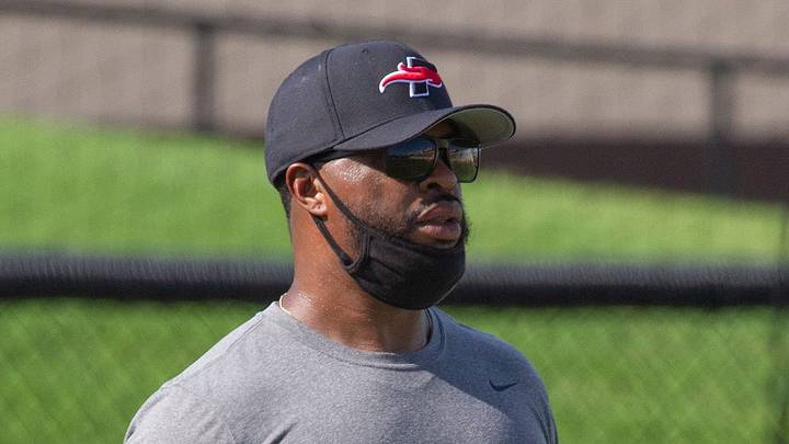Southeastern University wide receivers coach Johnnie Mack evaluates his players during the teamÕs first practice at Victory Field in Lakeland Saturday. Mack is a former Lakeland High School player and helped and was a member of the schoolÕs 1999 State Championship team. August 15, 2020. MICHAEL WILSON | LEDGER CORRESPONDENT Southeastern University wide receivers coach Johnnie Mack evaluates his players during the teamÕs first practice at Victory Field in Lakeland Saturday. Mack is a former Lakeland High School player and helped and was a member of the schoolÕs 1999 State Championship team. August 15, 2020. MICHAEL WILSON | LEDGER CORRESPONDENT